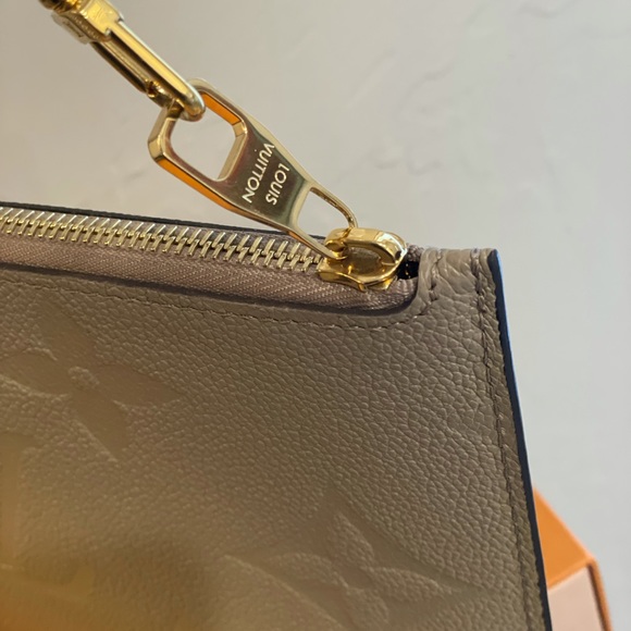 SOLD neverfull wristlet empreinte turtledove - Picture 5 of 11